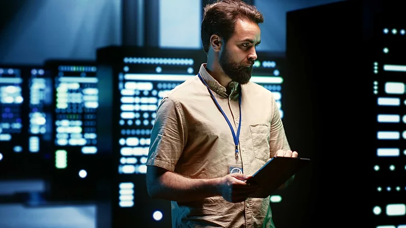 Field engineer working in a data centre server hall